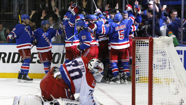 rangers-celebrate-game-7-capitals-holtby.jpg